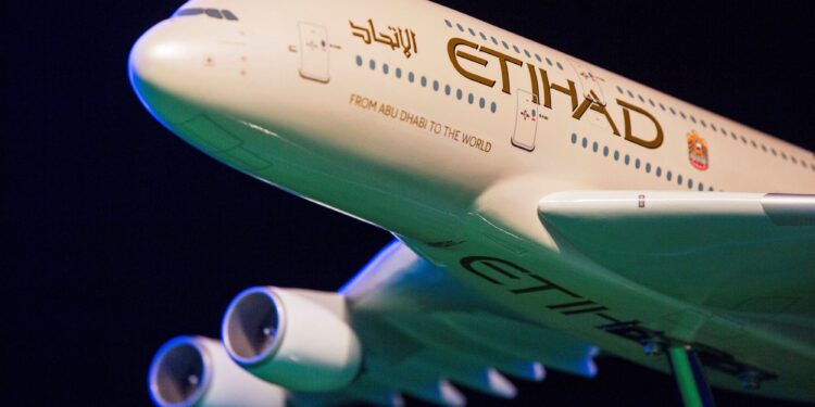 FILE PHOTO: A model Etihad Airways plane is seen on stage in New York, U.S. November 13, 2014.  REUTERS/Lucas Jackson